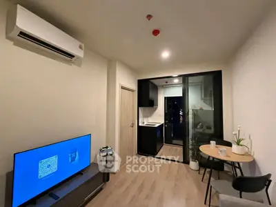 Modern living room with open kitchen and stylish decor