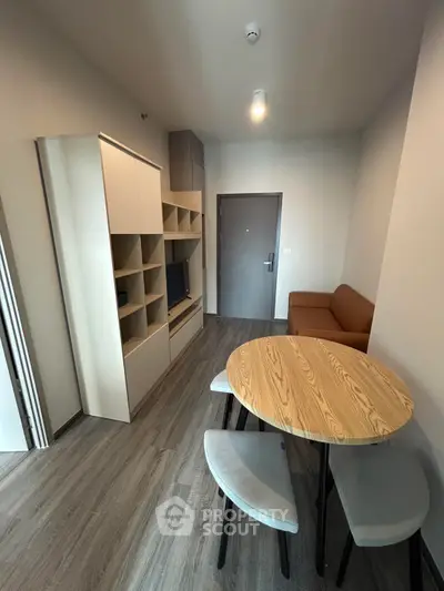 Modern living room with sleek furniture and cozy seating area