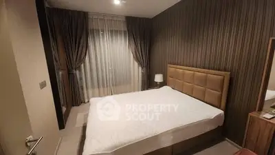 Cozy modern bedroom with elegant decor and large bed