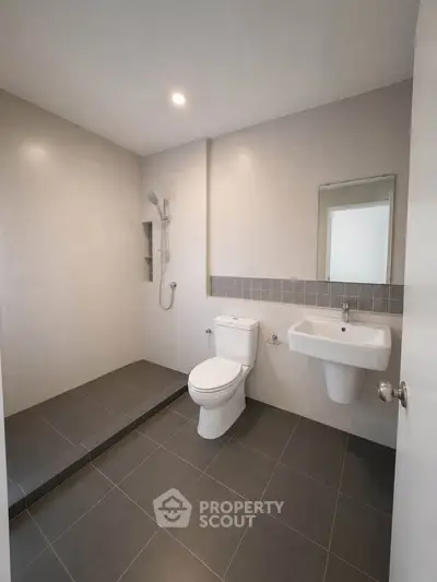 Modern bathroom with sleek design and spacious shower area