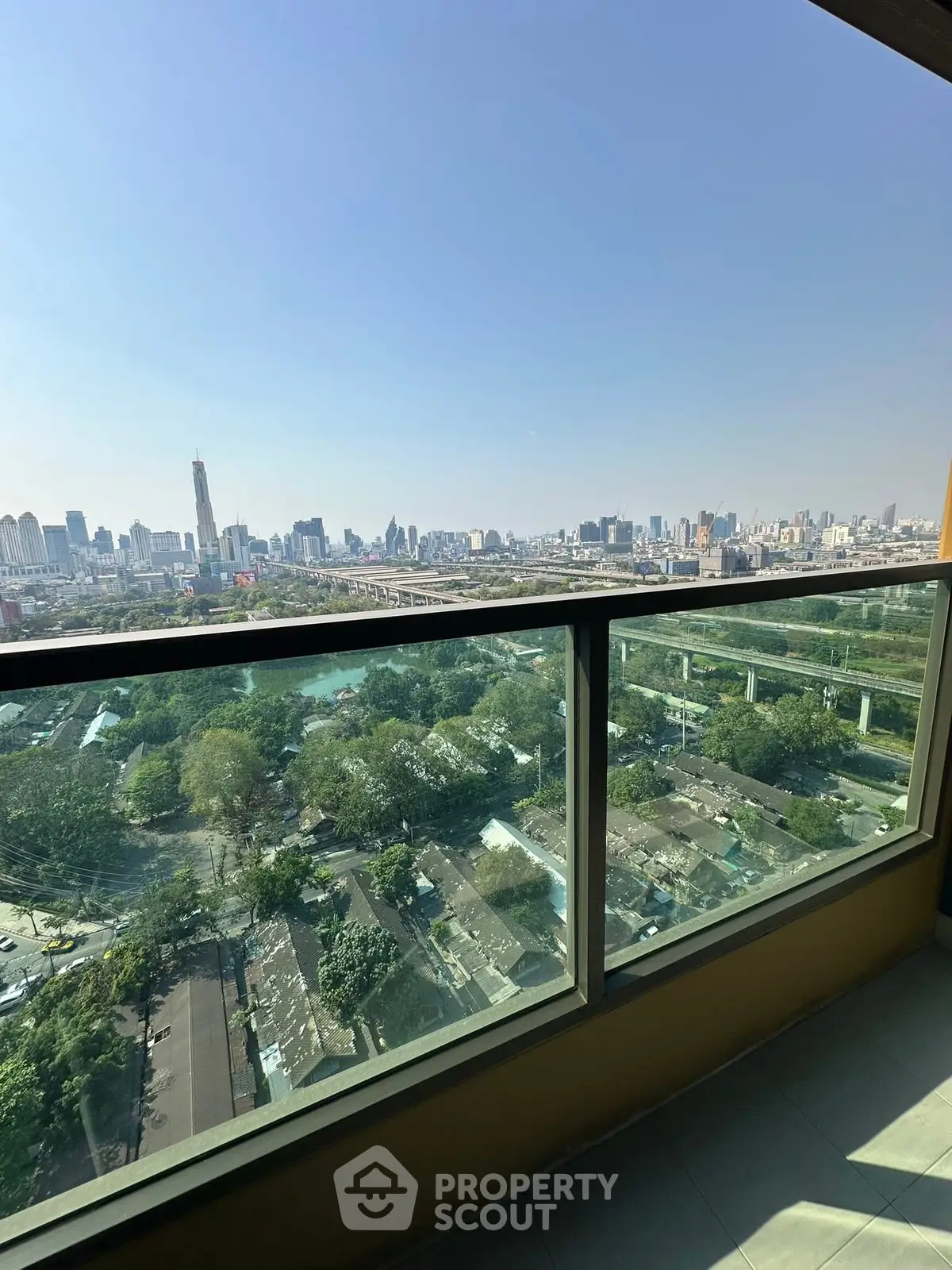 Stunning cityscape view from a high-rise balcony, perfect for urban living enthusiasts.