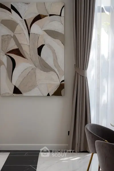 Elegant modern interior with abstract art and luxurious curtains