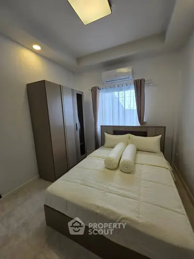 Cozy bedroom with modern furniture and natural light