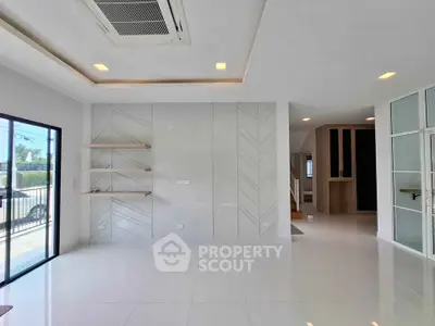 Spacious modern living room with sleek design and natural light