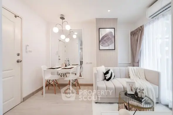 Modern living room with chic decor and cozy dining area