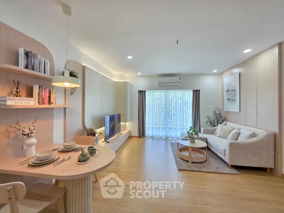 Spacious modern living room with elegant decor and natural light