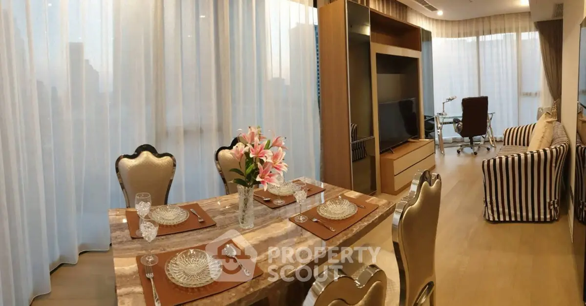 Luxurious living room with elegant dining area and modern decor in high-rise apartment.
