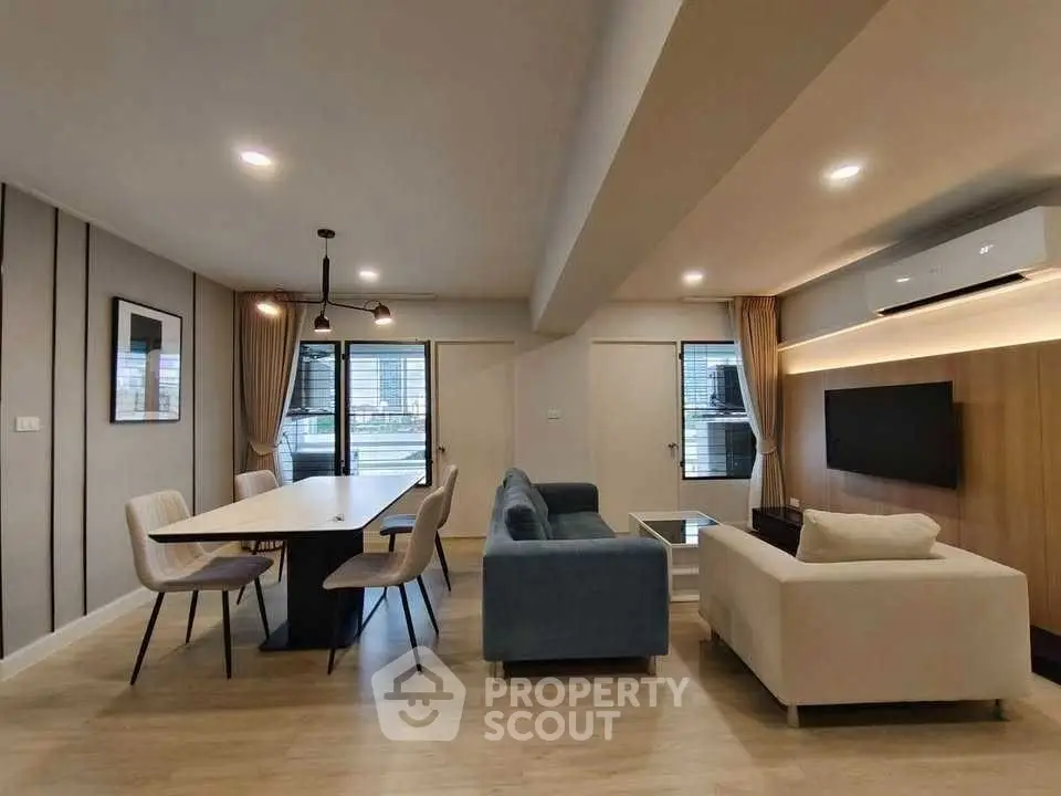 Modern living room with stylish furniture and ambient lighting