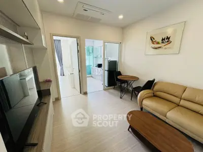 Modern living room with stylish furniture and open layout in a contemporary apartment.
