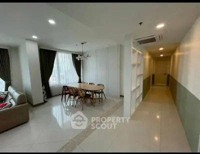 Spacious modern living room with elegant dining area and stylish decor