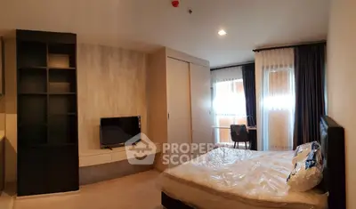 Modern bedroom with stylish furniture and natural light