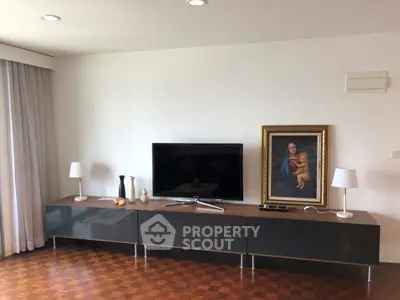Stylish living room with modern TV stand and elegant decor, perfect for contemporary living.