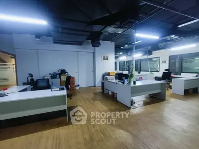 Spacious modern office with sleek desks and ample lighting