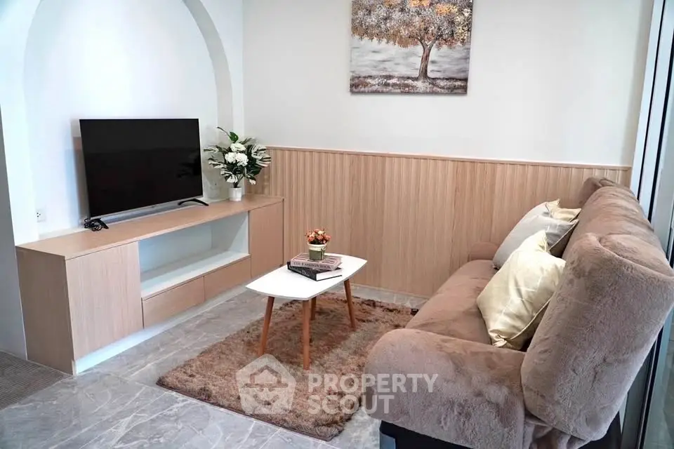 Cozy living room with modern decor and comfortable seating