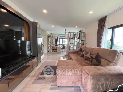 Spacious living room with modern decor and large sectional sofa
