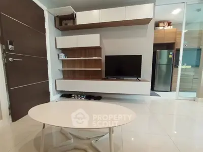 Modern living room with sleek TV unit and stylish coffee table