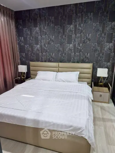 Luxurious bedroom with modern decor and elegant lighting