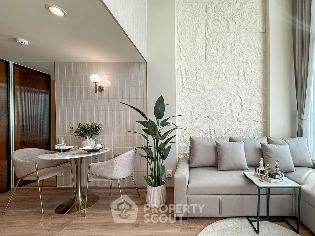 Modern living room with elegant decor and cozy seating area