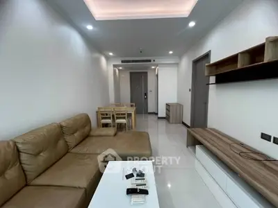 Modern living room with sleek furniture and open layout, perfect for contemporary living.