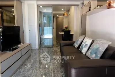 Modern living room with sleek design and marble flooring