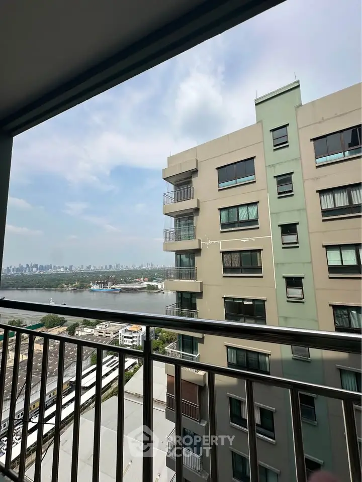 Stunning cityscape view from a high-rise balcony, perfect for urban living enthusiasts.