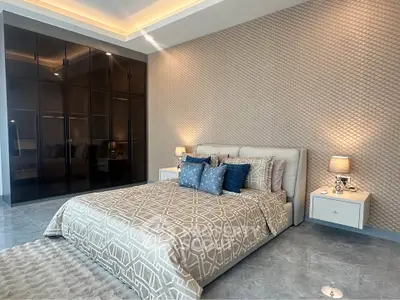 Luxurious bedroom with elegant decor and spacious wardrobe