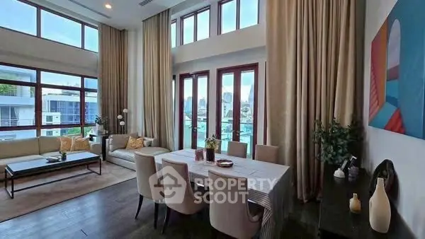 Luxurious modern living room with high ceilings and elegant decor