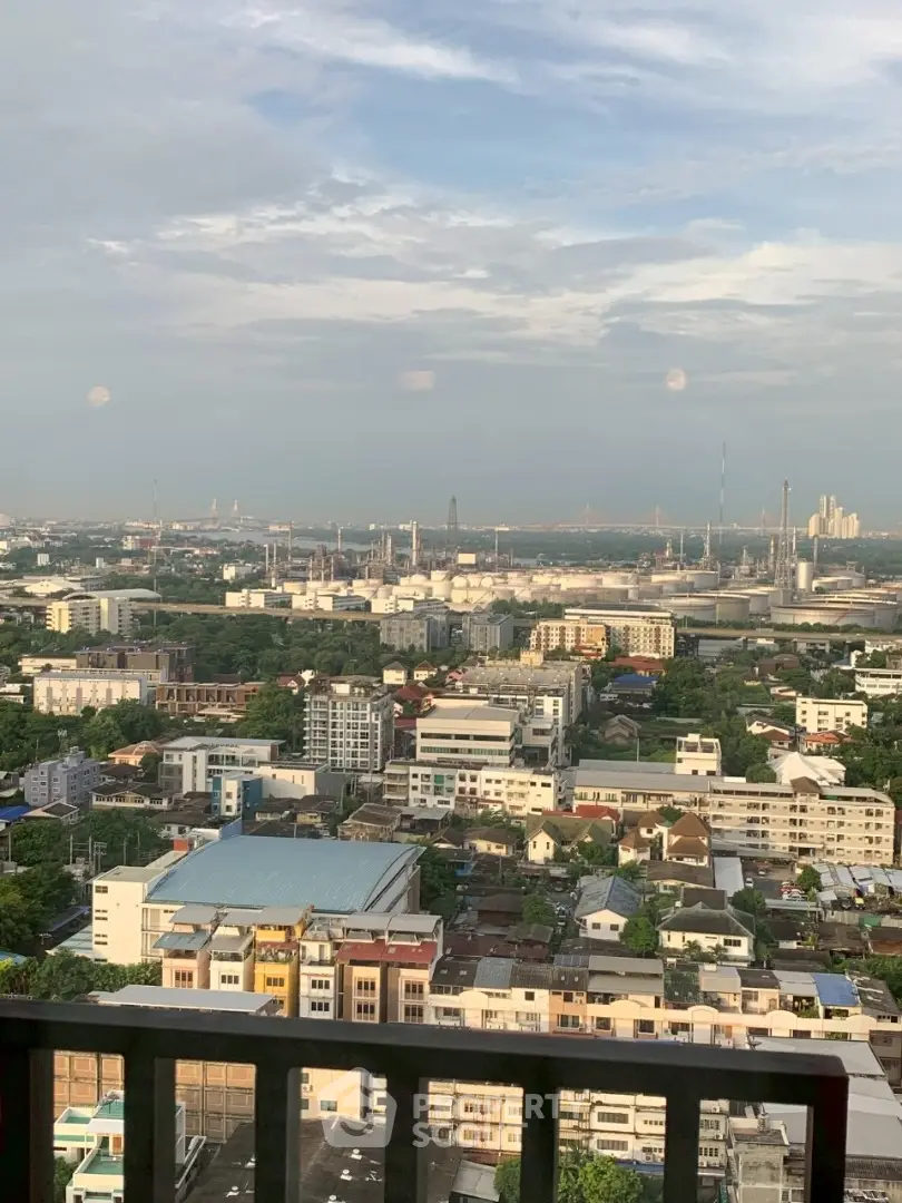 Stunning cityscape view from a high-rise balcony showcasing urban living at its finest.