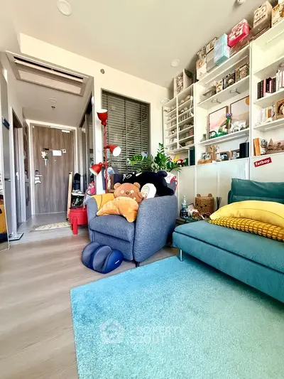 Charming living room with cozy seating and vibrant decor, perfect for relaxation and entertaining.