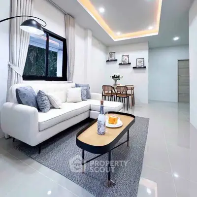 Modern living room with stylish decor and cozy seating area