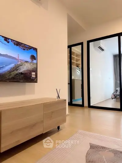 Modern living room with sleek TV setup and stylish decor