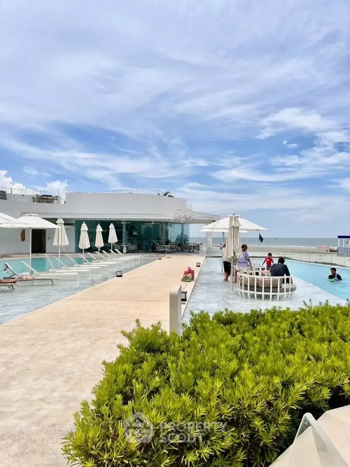 Luxurious rooftop pool with stunning ocean view and modern amenities