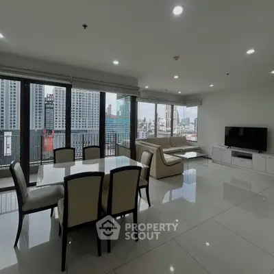 Spacious modern living room with city view and elegant dining area