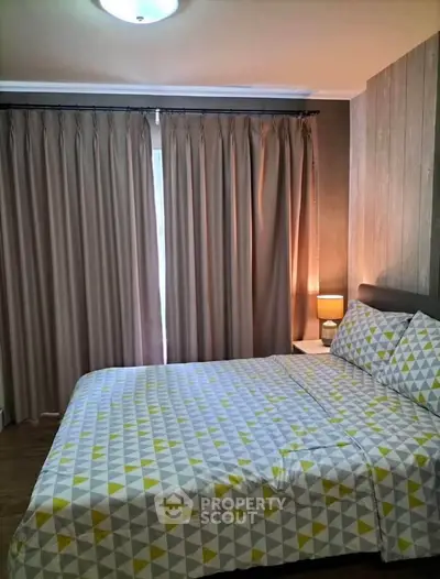 Cozy bedroom with modern decor and stylish bedding