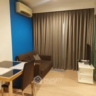 Modern living room with air conditioning and stylish furniture