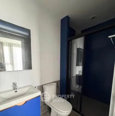 Modern bathroom with sleek design and glass shower enclosure