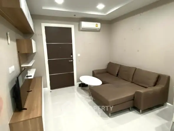 Modern living room with sleek furniture and air conditioning