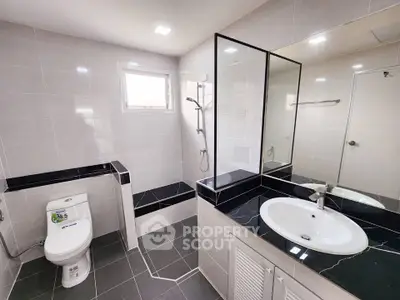 Modern bathroom with sleek design and spacious layout