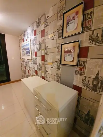 Stylish hallway with modern decor and sleek white storage unit