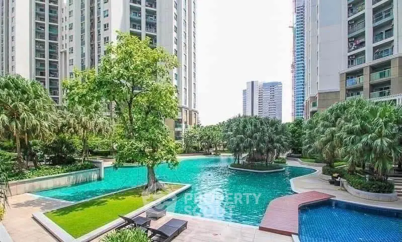 Luxurious residential complex with stunning pool and lush greenery, offering a serene urban oasis.