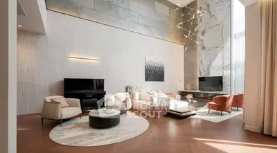 Luxurious modern living room with high ceilings and elegant decor