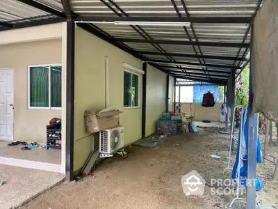 Covered outdoor area with air conditioning unit and storage space