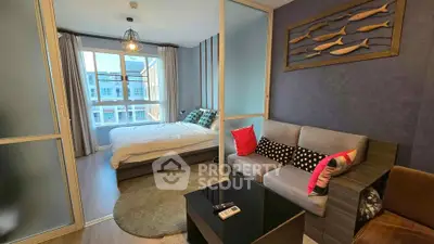 Modern studio apartment with cozy living area and stylish bedroom