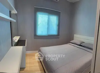 Cozy bedroom with modern design and natural light