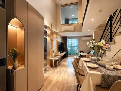 Luxurious modern living room with open dining area and stylish decor