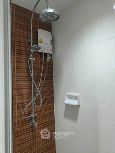 Modern bathroom shower with sleek design and water heater