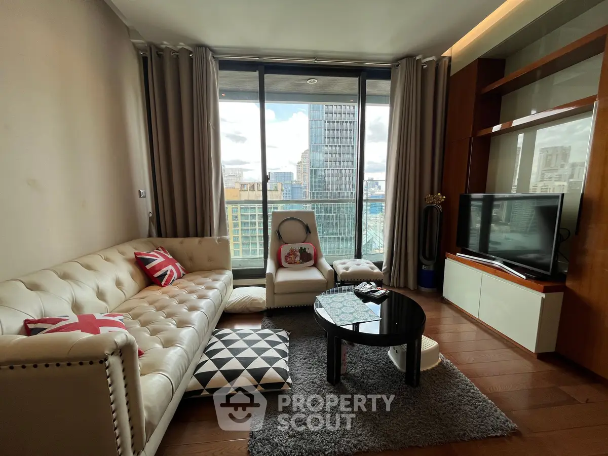 Luxurious living room with stunning city view, elegant furniture, and modern decor in high-rise apartment.