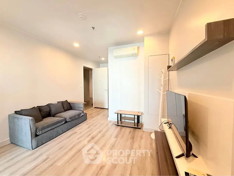 Modern living room with sleek design and cozy sofa in a bright apartment