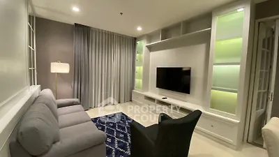 Modern living room with sleek furniture and ambient lighting