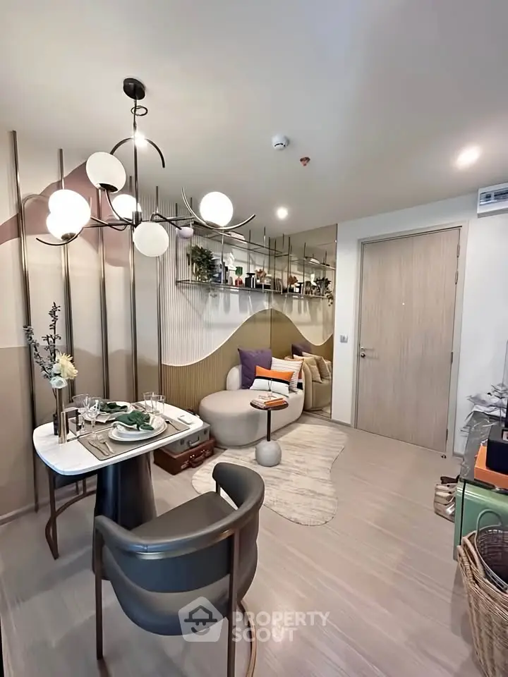 Modern living room with stylish decor and dining area in a contemporary apartment.